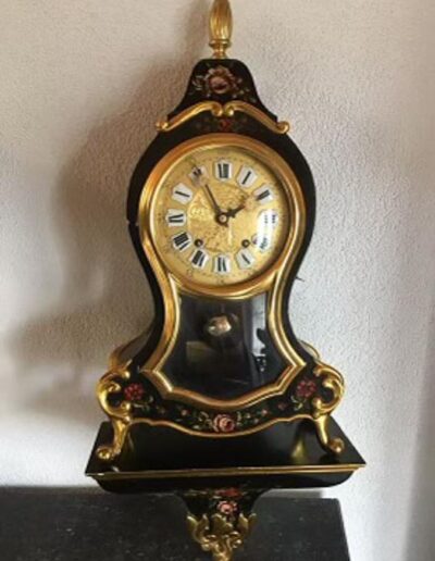 Horloge Neuchâteloise dorures