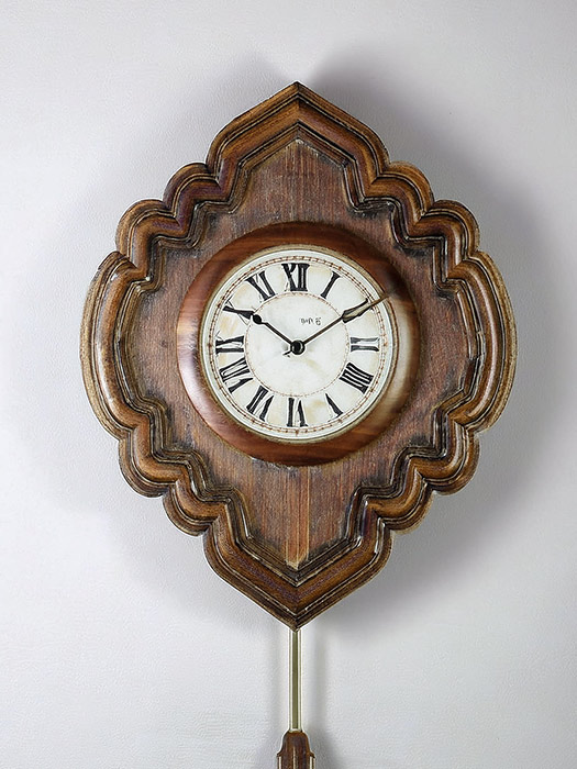 Oeil de boeuf pendule horloger