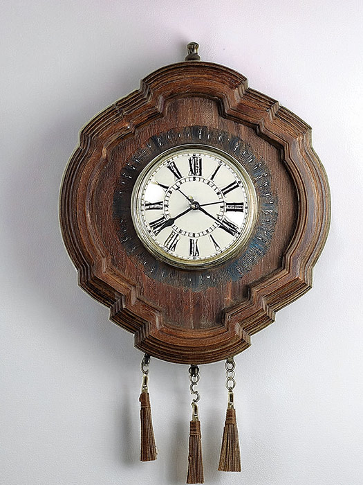 oeil de boeuf pendule réparation